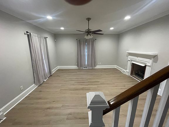 Living Room with double-sided fireplace.