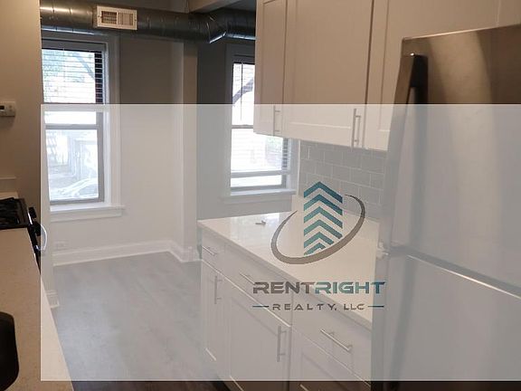 4th image of 1249-55 W Henderson St #12511