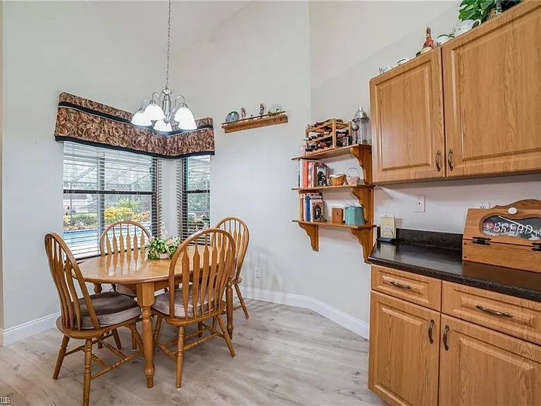 5980 Hidden Oaks Ln — Photo 8