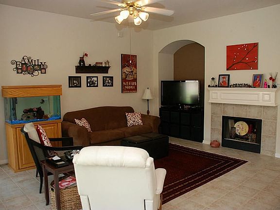 Spacious family room with fireplace.