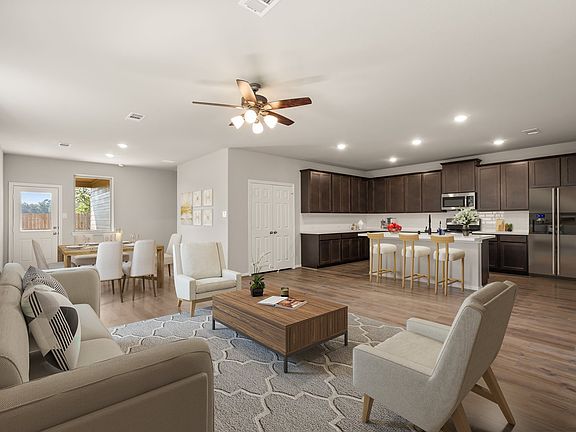 Gather the family and friends in the living room, open to the kitchen and perfect for entertaining