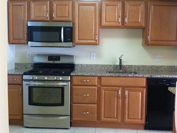 new kitchen with granite counters