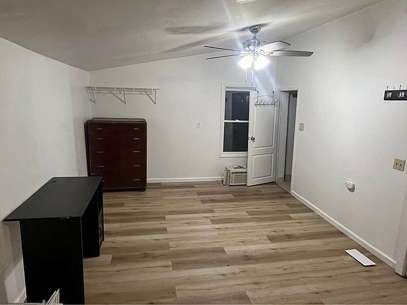 Living Room & Sleeping Area