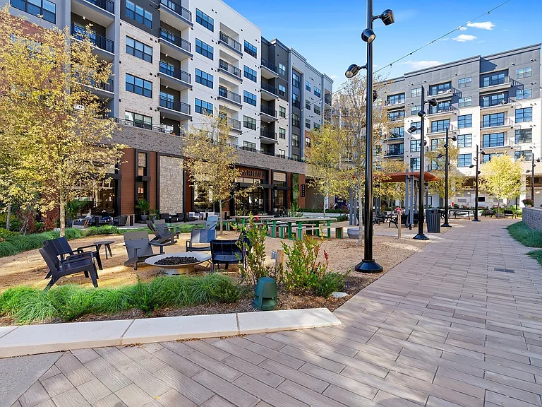 Enjoy the fresh air with cozy fire pits, open seating, and vibrant landscaping right outside your door.