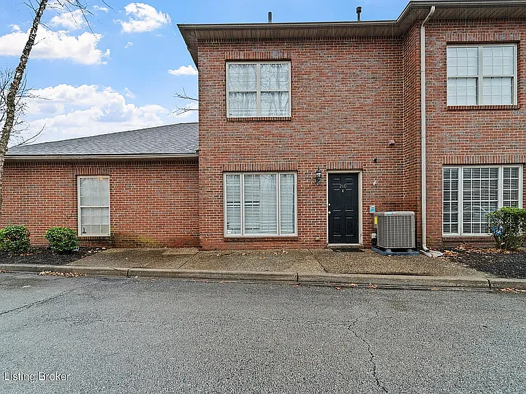 Back side of townhouse adjacent to additional parking - 210 Hampton Place Ct