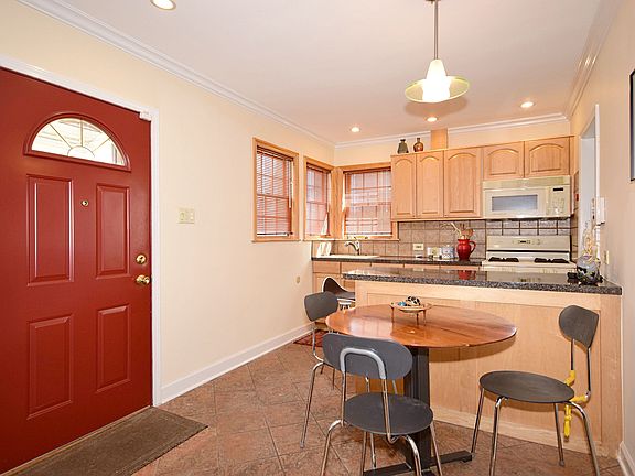 3rd image of 5566 N Leonard Ave