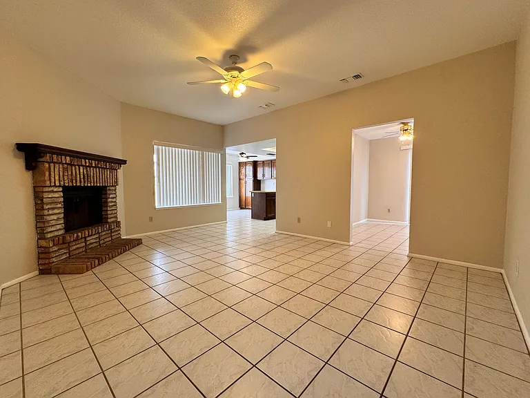 Family room with wood-burning fireplace