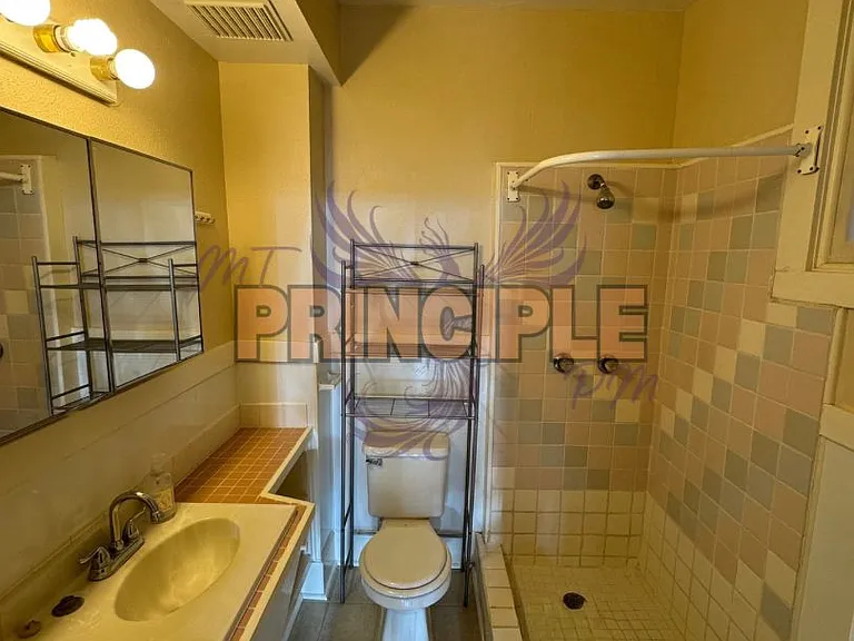 214 E 3rd St — Photo 5
