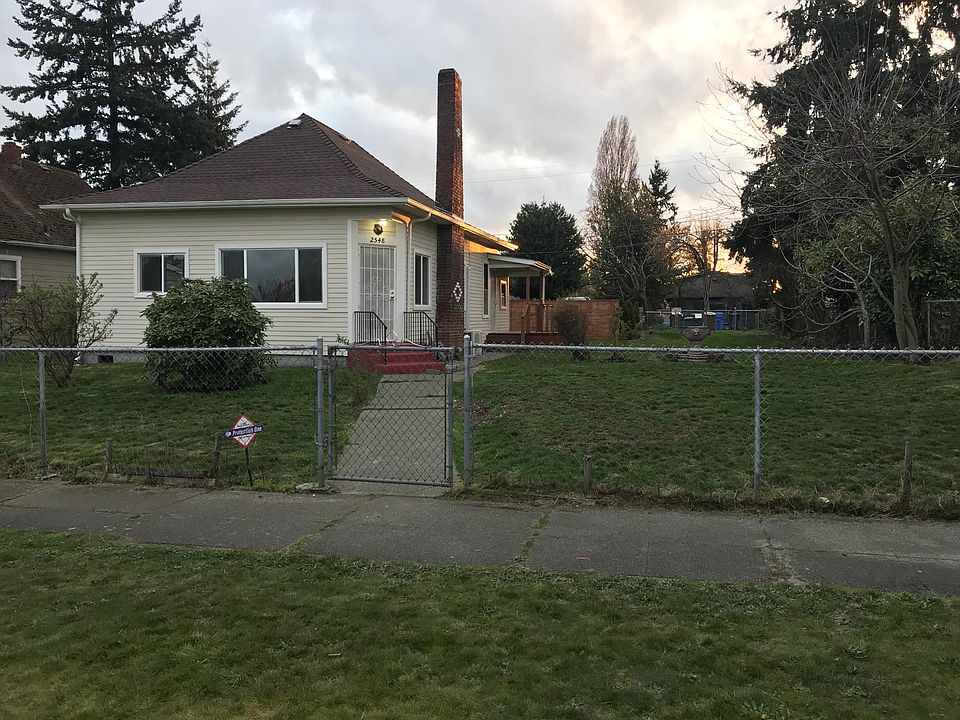 Welcome Home! Giant fully fenced yard sitting on 2.5 lots!