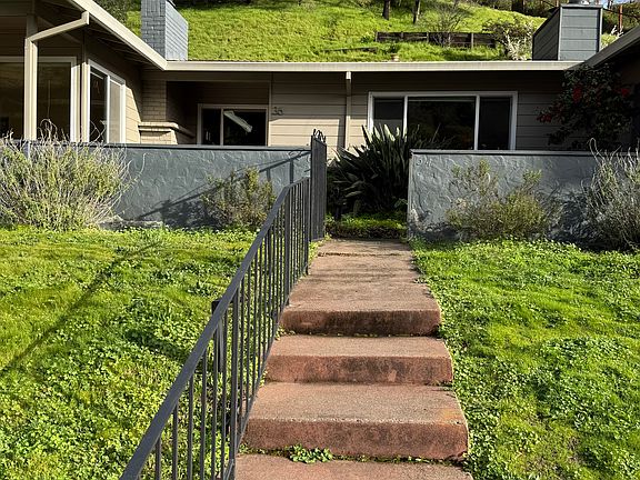 Solar lighting for the steps to the triplex at night. Gate typically closed leading to walkways to each unit. Fabulous neighborhood!