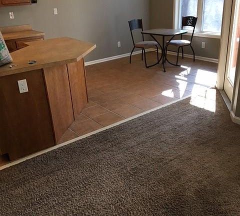 View from living room to sunny kitchen table