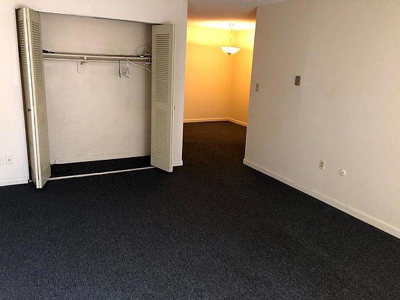 Bedroom. Dining area behind is the room in the back of the photo.