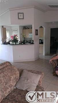 living room view to kitchen