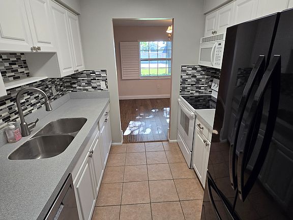 5th image of 1701 Belleair Forest Dr APT B
