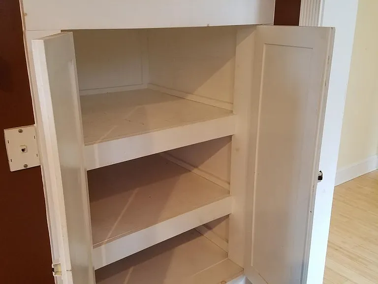 Pantry closet in kitchen.