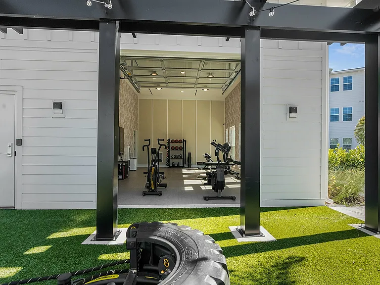 Get fit in style with this sleek and well-equipped home gym.