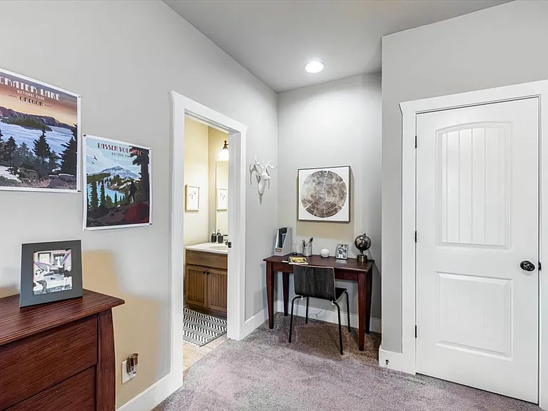 Comfortable study nook in private student apartments at The Cottages of Hattiesburg.