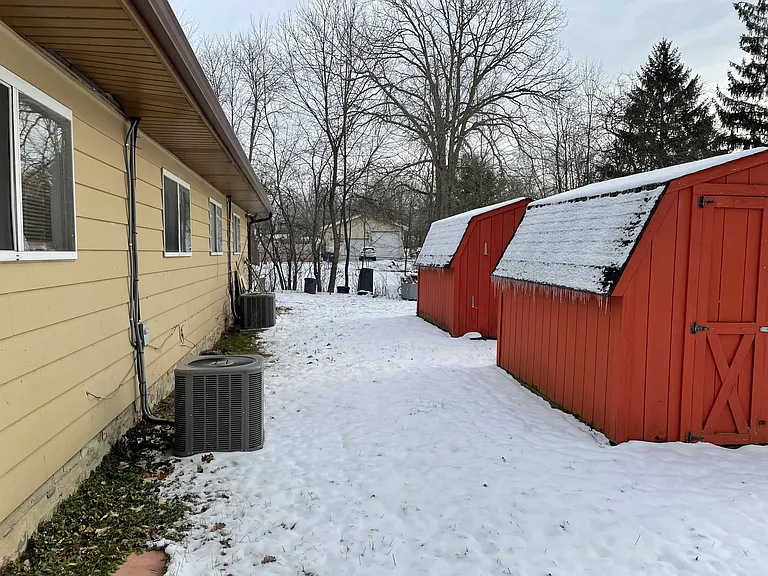 Backyard: Dedicated outdoor shed for extra storage, tools, & toys!