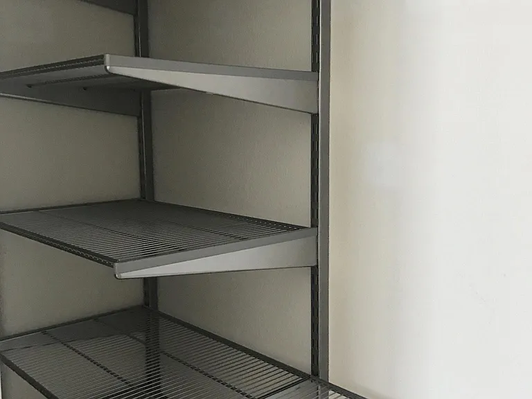Secondary bedroom custom racks and shelving
