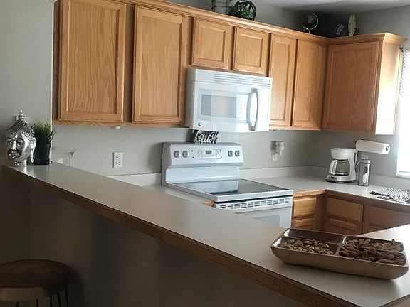 Kitchen bar/counter. Space for two stools.