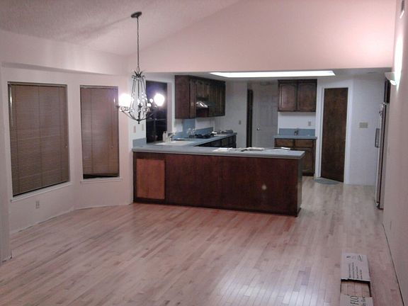 Open concept family room with eating area off specious kitchen