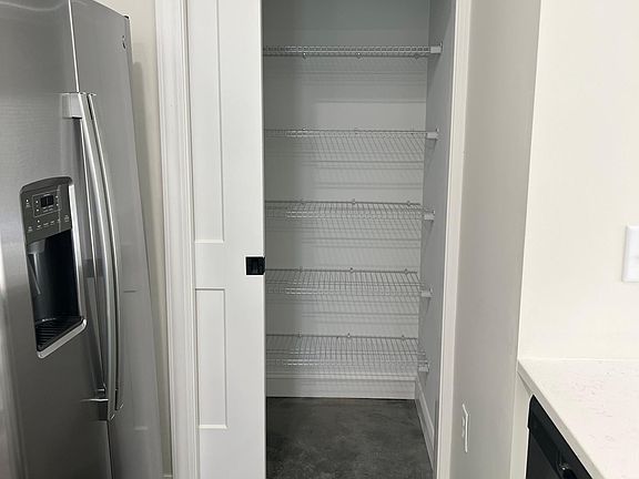 Pantry located in the kitchen