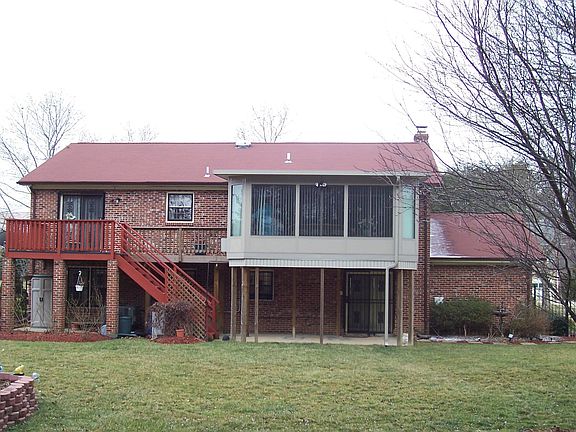 Rear view of deck & sunroom