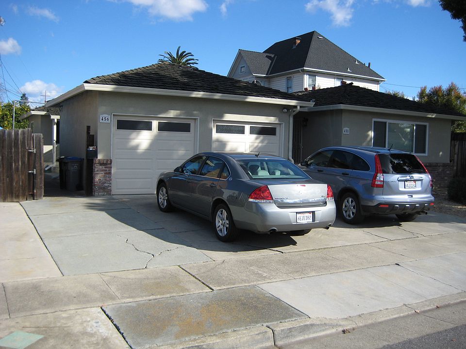 Entrance to 456 Doma Drive is on the left side of the garage.