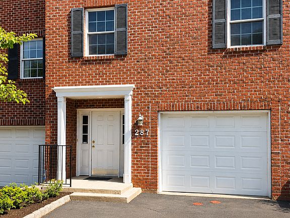 Welcoming Entry. Full Car Garage