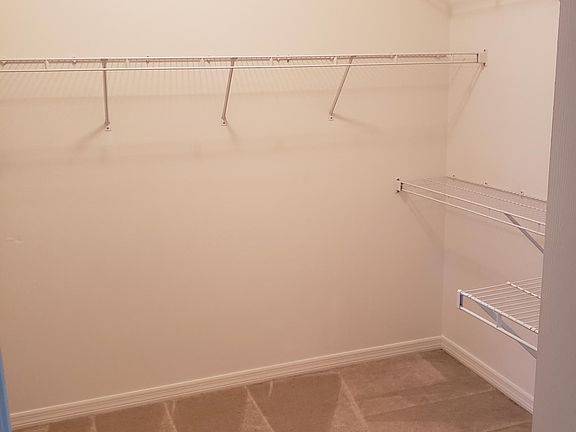 Master bedroom walk in closet. (Two other closets are also in master bedroom).