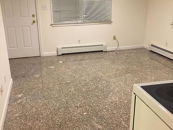 Living area includes kitchenette and exit