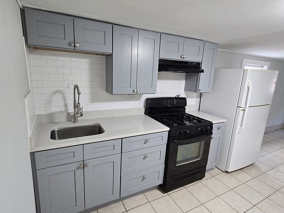 New Kitchen with Granet countertop soft close cabinets.
