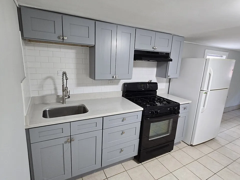 New Kitchen with Granet countertop soft close cabinets.