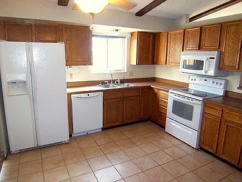 w/ White Appliances, Solid Surface Counters & Tile Floor 