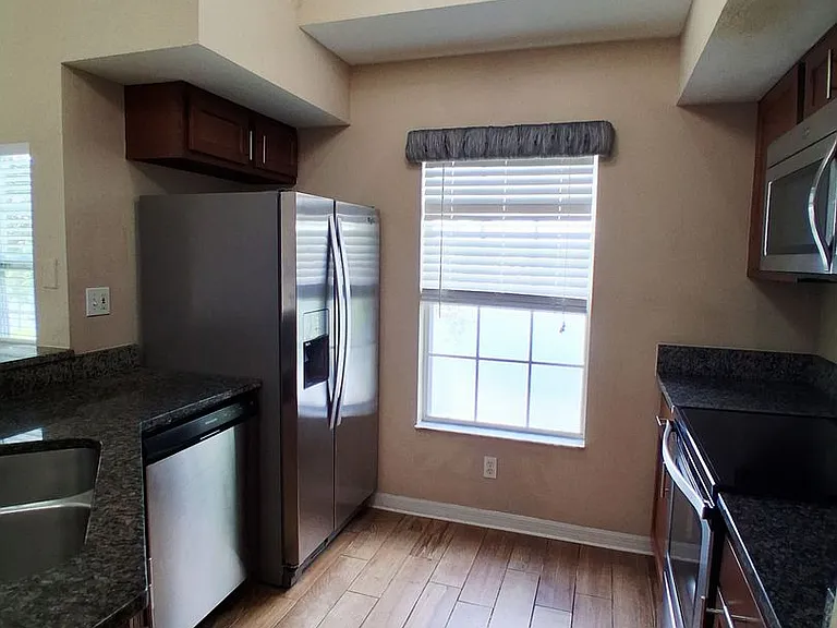 9020 Lake Chase Island Way — Photo 18