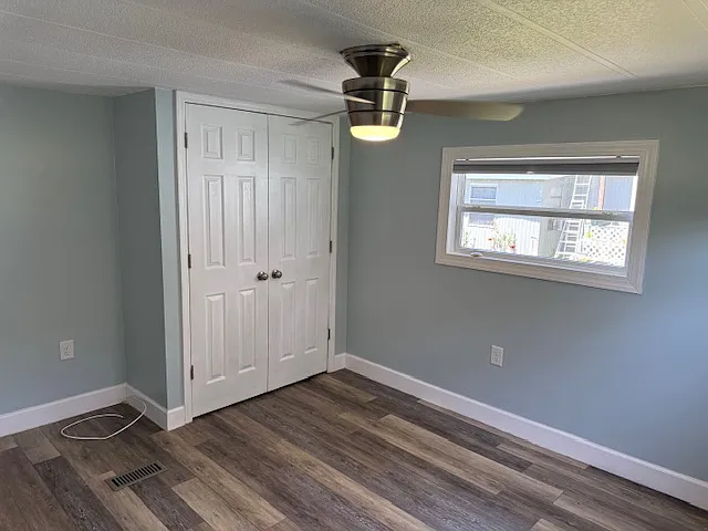 French doors for lots of closet space in master bedroom.