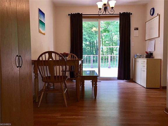 Your eat in kitchen allows you to enjoy the view from your park like back yard all year round and the sliding glass doors give y