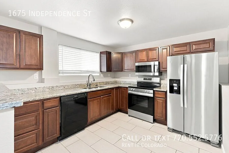 Charming 2BD/1BA Lower Unit with Oversized Backyard in Lakewood — Photo 2