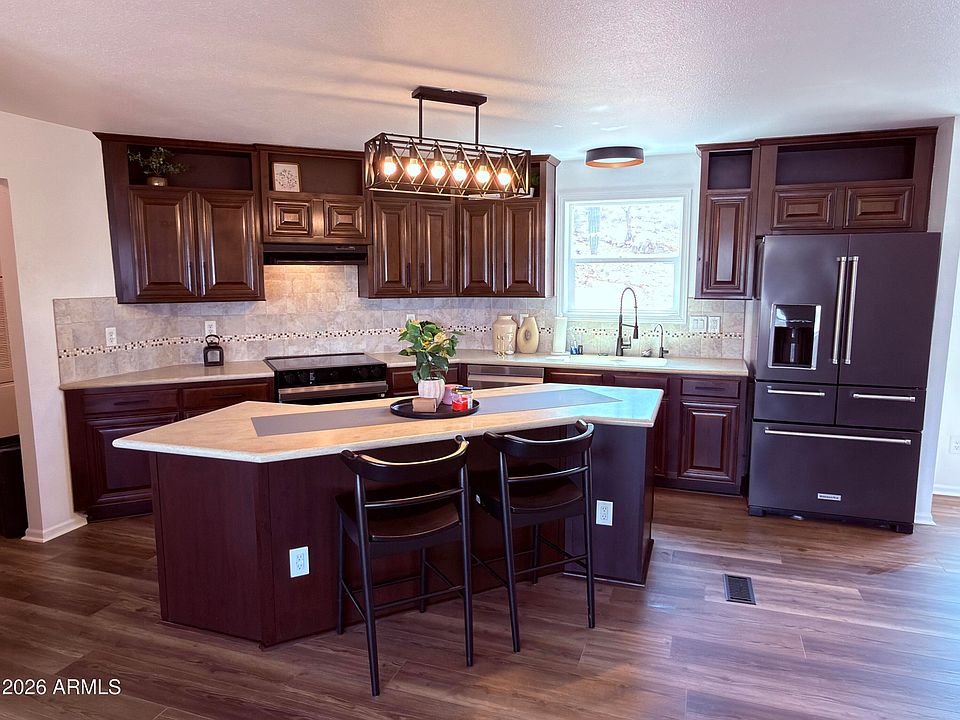 2nd image of 6135 E 34TH Avenue
