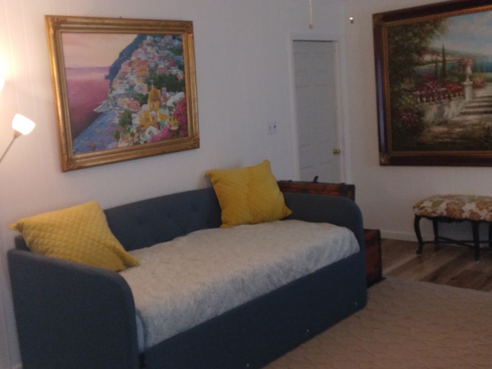 Bedroom full size bed with full trundle
Large closet, dresser, lounge chair