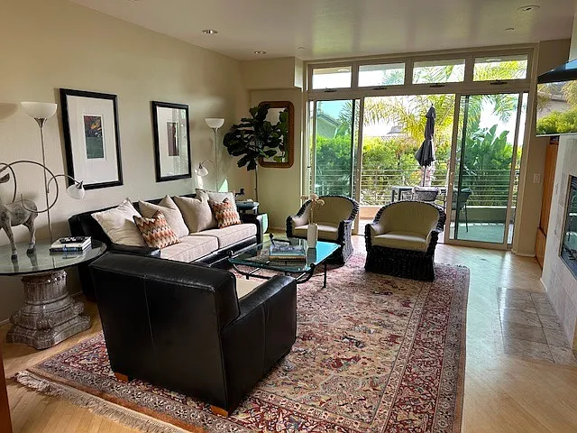 Beautifully furnished living room. Fireplace, Open deck.