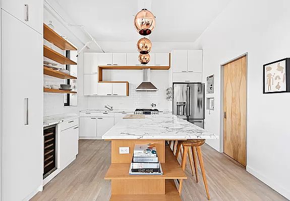 1st image of 148 W 23rd St APT 9E