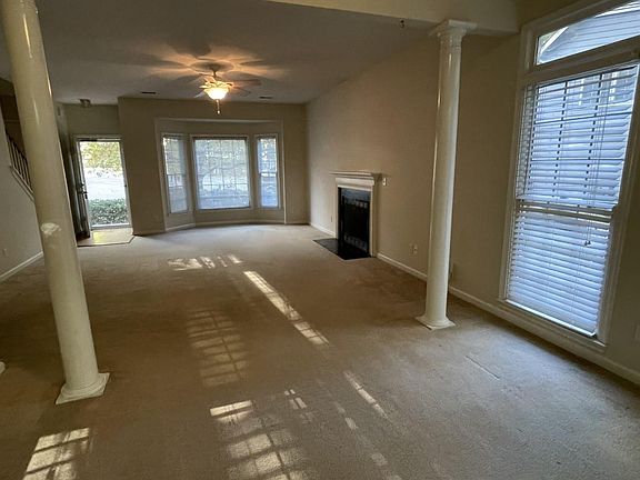 View of the Living Room with the bay window from the Dining Room