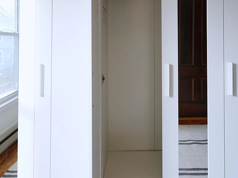 Two wardrobe closets in the second room