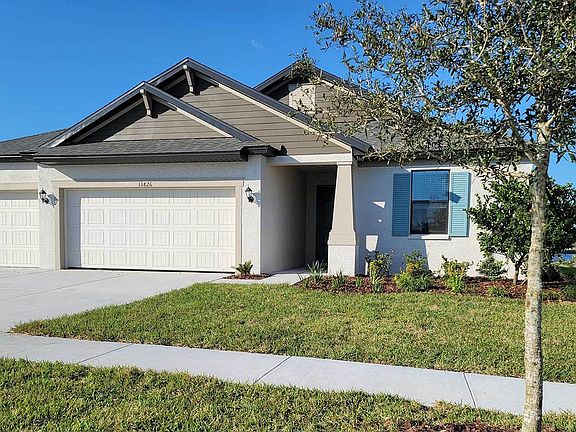 Sweetwater 3-car coastal elevation new home plan by William Ryan Homes Tampa