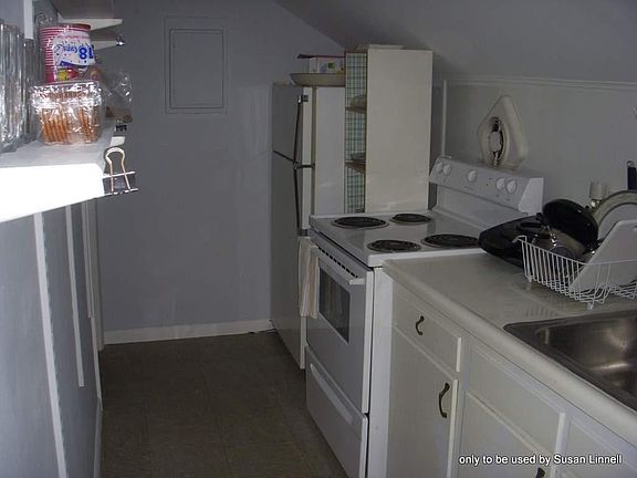 kitchen with fridge, stove and lots of storage