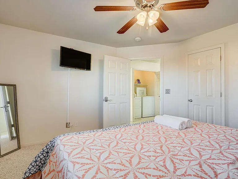King sized bed on the upper level with a TV!