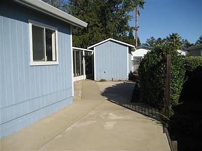 Additional Parking next to Garage to Storage Area