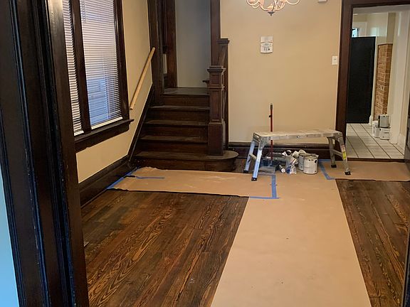 Living room. Just refinished floors and fresh coat of paint