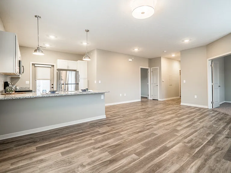 Each villa features an open layout with granite countertops, pendant lighting and kitchen islands or peninsulas.